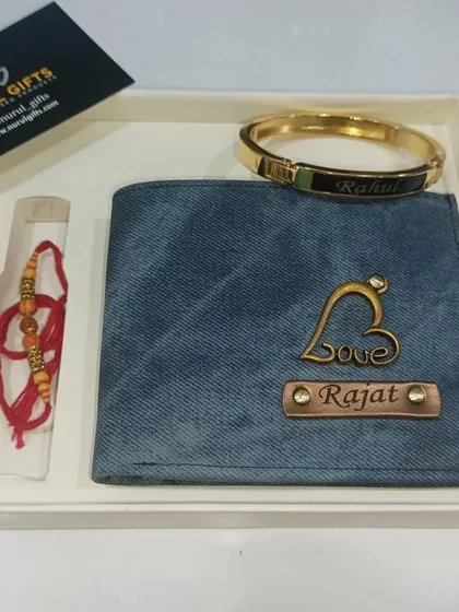 This Rakhi gift set includes a personalized denim wallet, a custom rakhi, and a stylish name-engraved kada (bracelet).