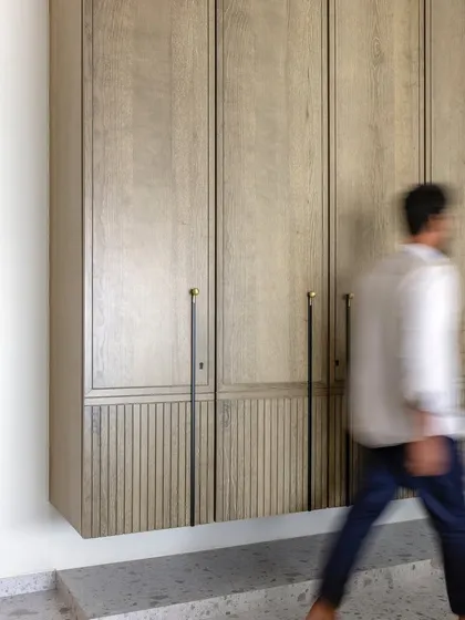 A wardrobe that defies gravity and convention. This floating wardrobe in a Mumbai apartment adds a touch of whimsy and wonder to the everyday routine, perfectly blending style and functionality.