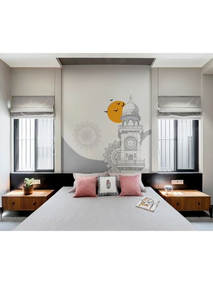 The bedroom is a calm and balanced space, with a custom mural, simple furniture, and large windows dressed with roman blinds.