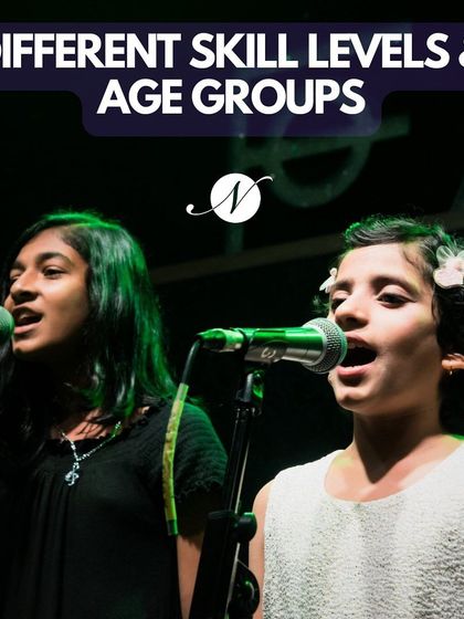 We welcome singers of all ages and skill levels. This photo shows two of our young vocal students performing together, highlighting the community and confidence we build.