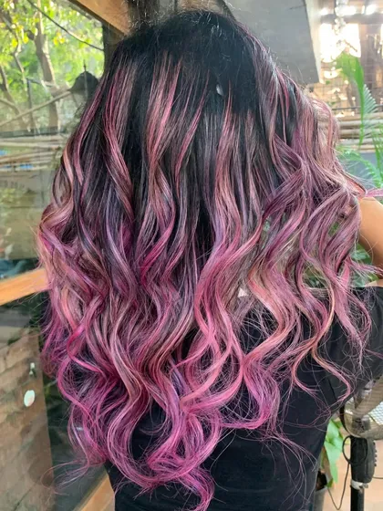 I call this one 'Pink Hibiscus'. A beautiful blend of pink and purple tones melt together for a dreamy, ethereal look. This is a bleach color, styled to show off the multi-tonal effect.