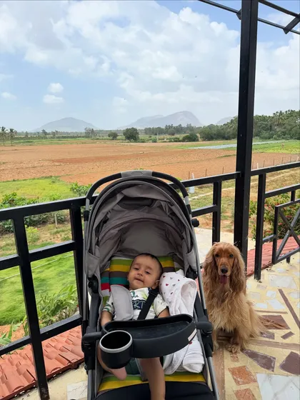 Our two boys enjoying the scenic view from the balcony.