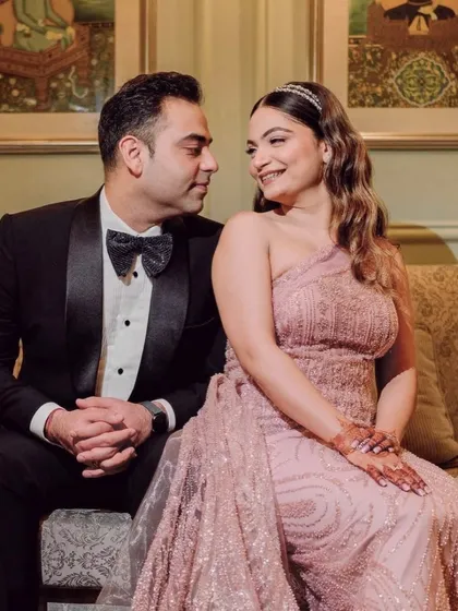 A lovely couple shot where her princess-like sangeet glam truly shines. The makeup is designed to look beautiful and romantic in every photo.