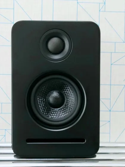 A closer look at one of the Platin Monaco satellite speakers. Each unit features dual drivers to produce a rich and dynamic frequency response. Because they are wireless, all they need is a power outlet, giving you complete freedom to place them for the best possible room-filling surround sound.