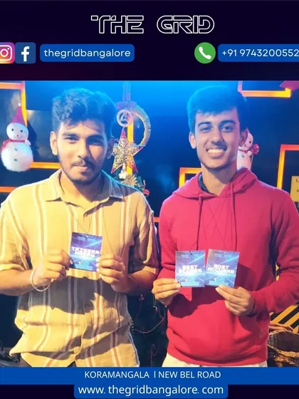 Another pair of laser tag champions with their awards.