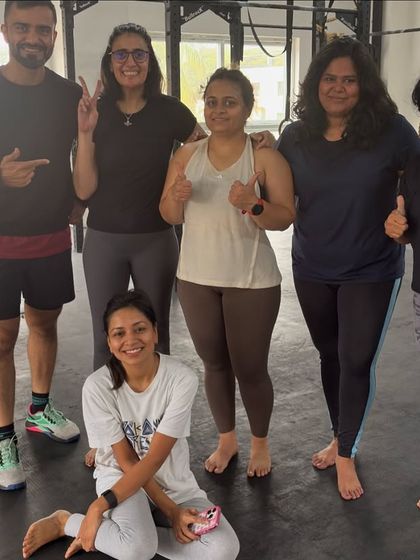 Thumbs up all around from this awesome group. It's great to see the satisfaction and camaraderie after everyone has put in the effort.