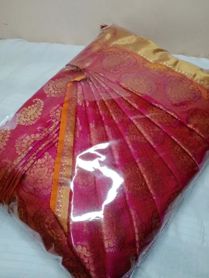 This wedding season, get your sarees pre-pleated and packed like this one, ensuring perfection and ease.