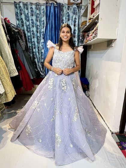 Another happy client trying on the lavender gown in my store. Seeing my clients feel like a princess in my creations is the best part of my job.