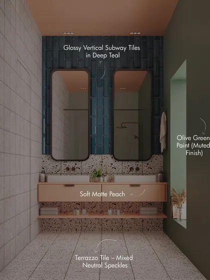 We believe bathrooms should be as thoughtfully designed as any other room. This space combines soft matte peach cabinetry with glossy deep teal subway tiles and a playful terrazzo floor, creating a unique and polished look that feels both modern and fun.