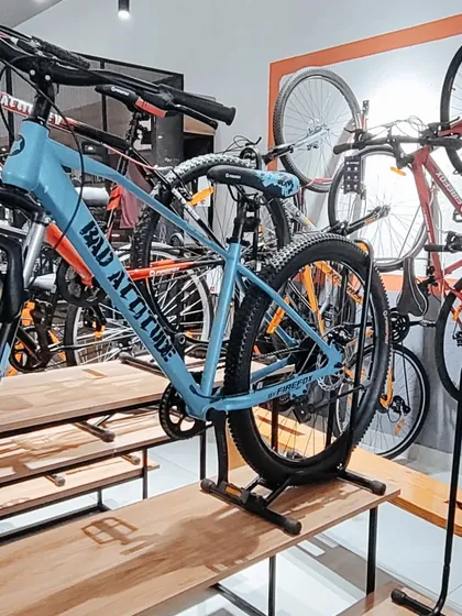 For commercial projects like this bicycle retail shop, the design must be both visually appealing and highly functional. I created custom tiered wooden displays to showcase products effectively while maintaining an open and inviting store layout.