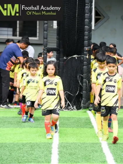 Our youngest players, including boys and girls, confidently marching onto the pitch for their weekend training session. We start building fundamentals and a love for the game from an early age.