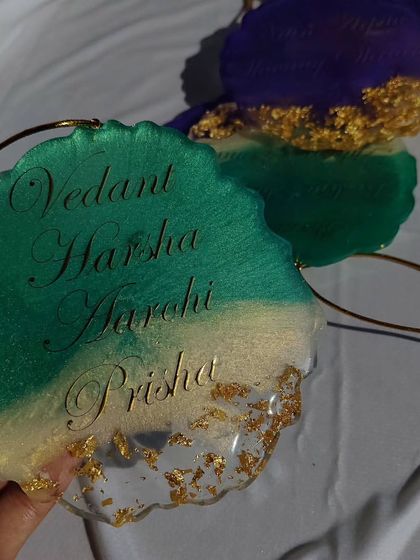 Another look at the family name car hanging, showing the geode-style edge and the shimmer of the green resin.
