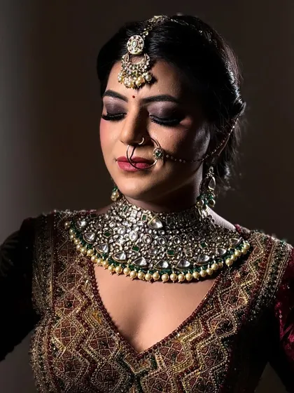 Another beautiful close up, showing the detail of the eye makeup and the way the light catches the jewelry.