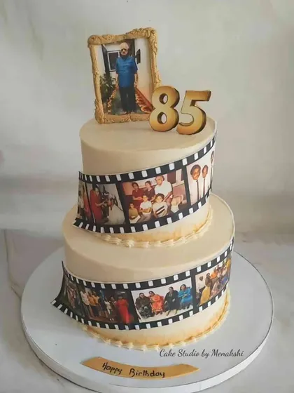 A life story told in cake. This two-tier 85th birthday cake features an edible photo reel of cherished memories, celebrating a beautiful journey. It’s a deeply personal way to honor a loved one.