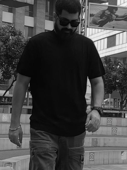 Another candid walking shot from an outdoor photoshoot.