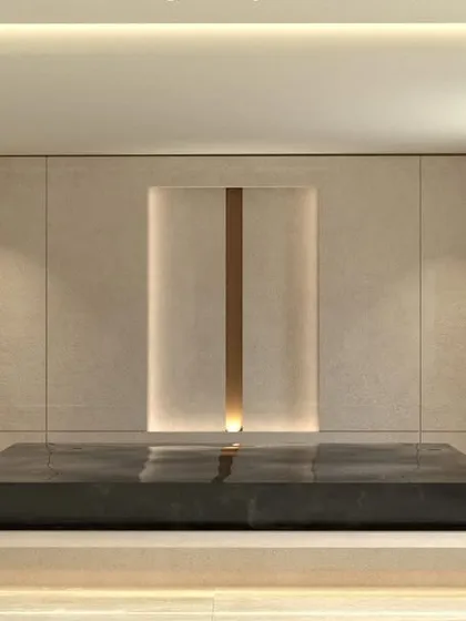 We designed this serene entrance with a calming water feature. The sound and sight of water greet you at the door, creating a tranquil transition from the outside world and bringing positive energy into the home.