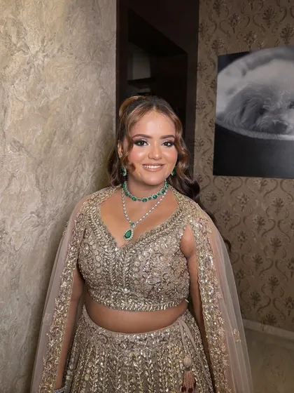 My special girl Kiara, looking absolutely stunning for her engagement. We created a glamorous look with a smokey eye and a flawless base, paired with a high ponytail to show off her beautiful emerald jewelry.