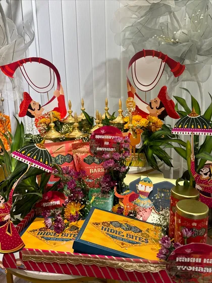 The complete Rakhi trousseau for a bride-to-be. This grand platter is a celebration in itself, with multiple elements and a rich, festive feel.