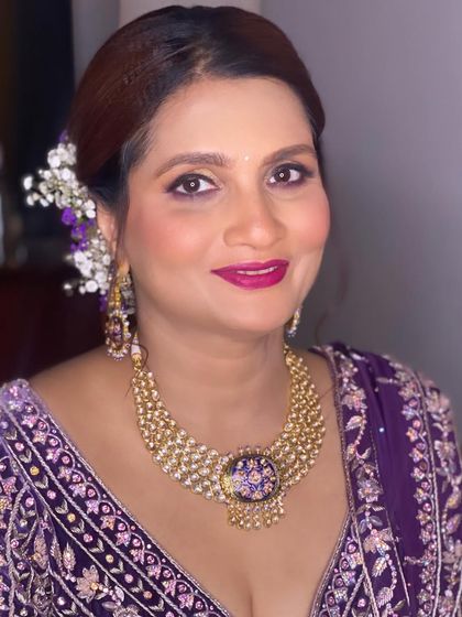 Radiant in regal purple. To complement this season's trending color, I kept the makeup subtle and focused on perfecting the skin, letting the outfit and her natural beauty do the talking.