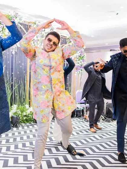 The signature step. In every group dance, I love to include a hook step that's easy for everyone to do together and looks fantastic in photos. This moment from a sangeet performance shows that perfectly.