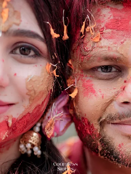 This is the raw, unfiltered joy I live to capture. A close-up from a Haldi ceremony, where the colors, textures, and genuine smiles tell a story of love and celebration that is beautifully messy and absolutely perfect.