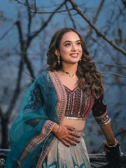 The bride's radiant smile captured in a candid moment during her evening celebration.