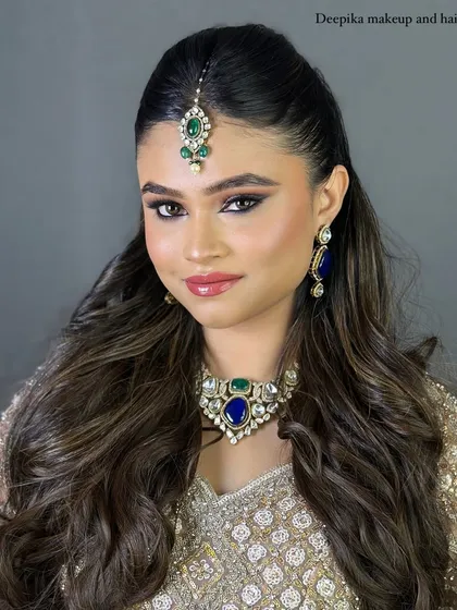 I love the elegance of a North Indian bride. This look features soft, shimmery eyeshadow, a sharp winged liner, and a glossy lip, all balanced perfectly with intricate jewelry. I teach you how to create these reception-ready looks.