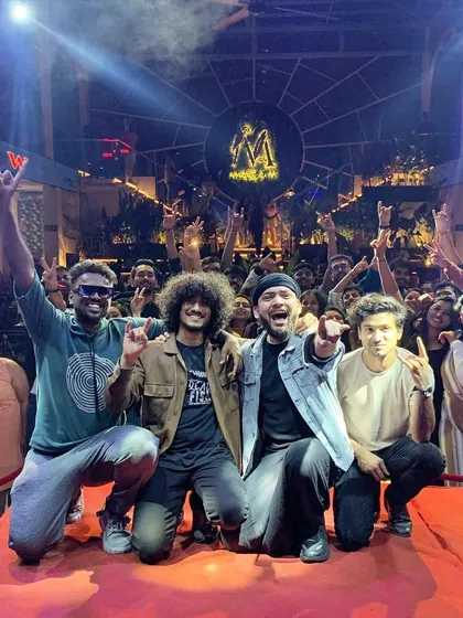 The show's over but the energy is still high. Posing with the incredible crowd at Macaw By Stories. It’s a team effort, and our audience is the biggest part of our band.