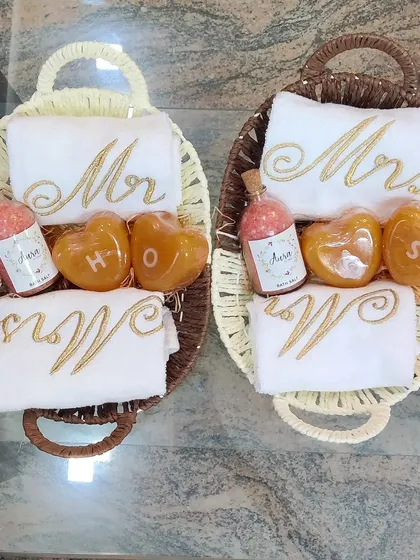 I also offer affordable and cute gift hampers for couples. These baskets include 'Mr' and 'Mrs' towels, heart-shaped initial soaps, and a bottle of my relaxing bath salts.