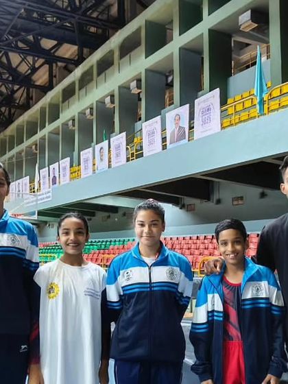 More moments of triumph from various competitions, showcasing our gymnasts with their medals, trophies, and proud coaches.