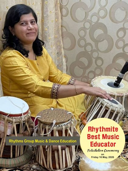Ms. Manjiri Mandar Marathe, our award-winning tabla educator, pictured with her instruments. Her passion for teaching percussion is evident in her students' success.