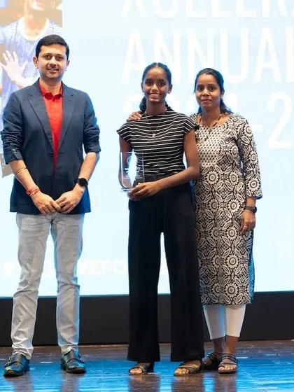 An Xcelerate player and her mother on stage, a proud moment for the Bravo family.