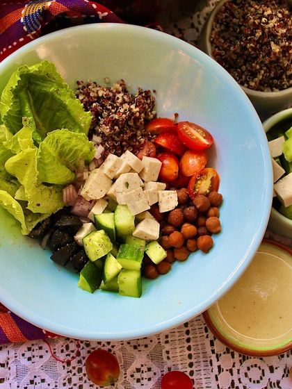 Our High Protein Salad Bowl is a perfect blend of organic quinoa, savory black chana, and silken tofu. It's a complete meal that's both energizing and delicious.