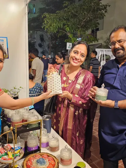 A lovely couple picking out some candles at my exhibition stall. Seeing my products bring joy to people is the best part of this journey.
