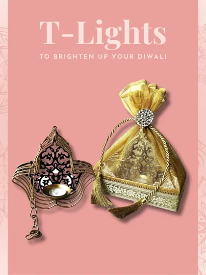 A hanging Hamsa-shaped T-light holder, packaged in a golden potli. This is a unique decorative item that can be hung in a window or pooja room.