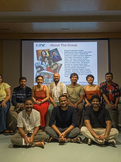 The cast and crew of a theatre production posing for a group photo on our stage.