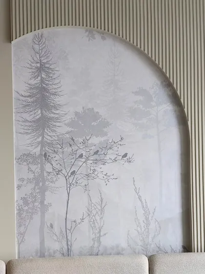 Installing wallpaper in non-standard shapes like this arch requires precision and skill. I ensure the pattern is perfectly aligned and cut for a seamless finish, transforming an architectural feature into a work of art.