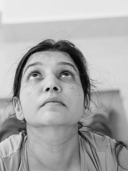 A portrait of a practitioner connecting with herself. My intention is to be a facilitator on this journey, helping each person blossom and find peace and happiness.