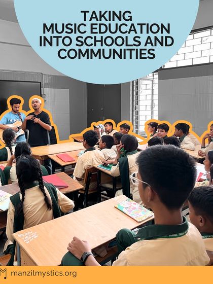 We take music education into schools and communities. Here, students gather around our fellows in a classroom, excited to learn before their visit to the Music Bus.