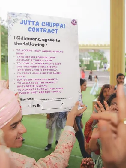 The 'Jutta Chuppai' contract! We love adding fun, modern twists to old traditions, creating laughter and unforgettable memories for the couple.