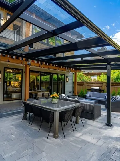 Experience the outdoors in any weather with our premium glass roof pergolas. This expansive patio cover uses toughened glass and a sleek metal frame to create a bright, airy, and fully protected space for dining and lounging.
