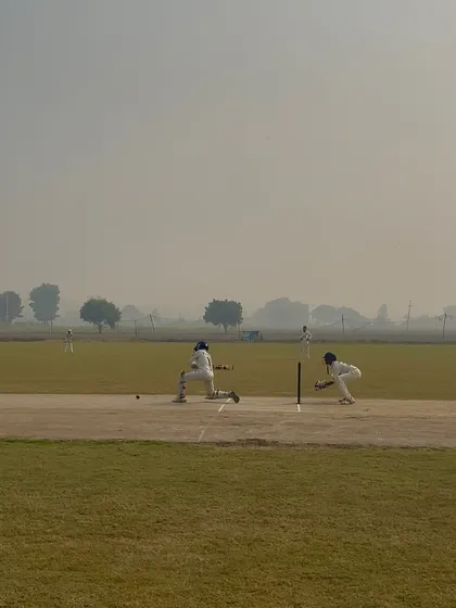 A batsman is run out. Sharp fielding from the opposition.