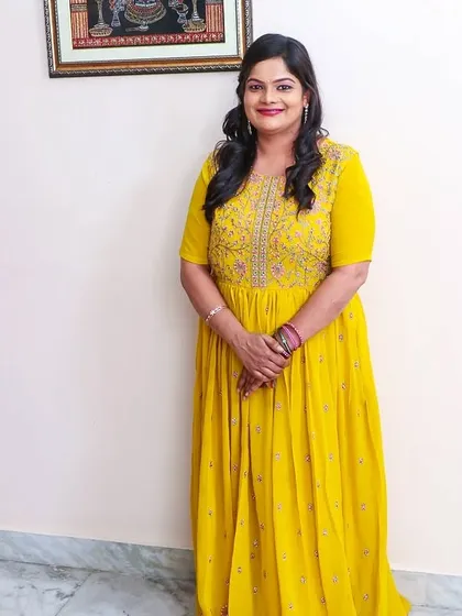 A full-length view of the simple and elegant look for a birthday party celebration.