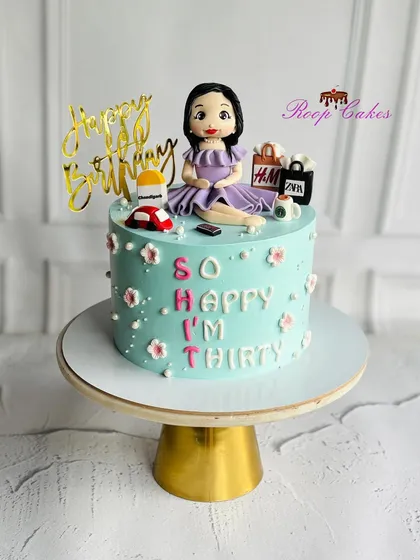Celebrating three amazing decades with style and sweetness. This 'So Happy I'm Thirty' cake is topped with a custom figurine and her favorite shopping bags.