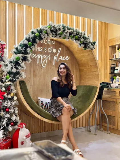 The salon decorated for Christmas, creating a calm and bright festive atmosphere for clients to unwind and enjoy the season.