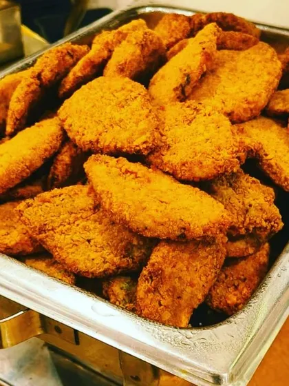 Our Bengali Fish Fry is a true classic, a recipe perfected over time. We use flaky Bhetki fish, marinated in traditional spices and coated with breadcrumbs for that perfect crunch, served with a side of sharp, tangy Kasundi mustard sauce.