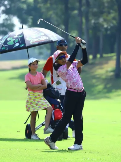 Aahana Shrivastava in full swing during a tournament, showcasing her focused technique.