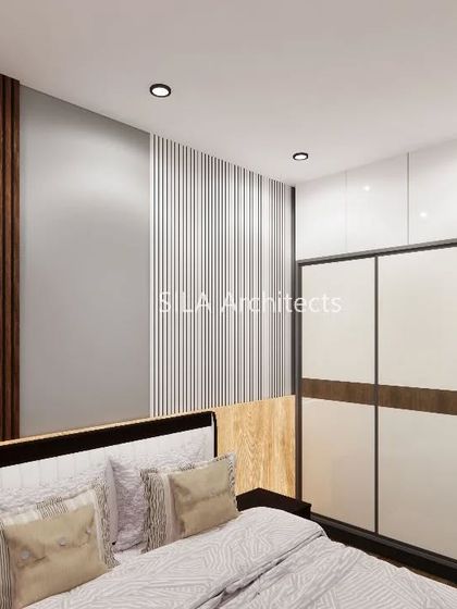 A bedroom design for our Vizag client, featuring a mix of wood, white, and grey panels for a modern and balanced look.