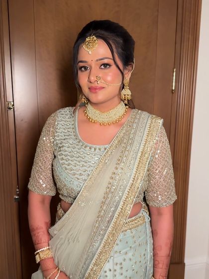 Another shot of the beautiful pastel bridal look. The makeup is designed to be long-lasting and photo-friendly, ensuring she looks perfect from every angle.
