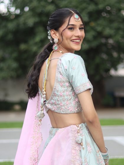 Such a happy and carefree photo! The makeup is designed to be long-lasting and picture-perfect, so you can enjoy every moment of your celebration.